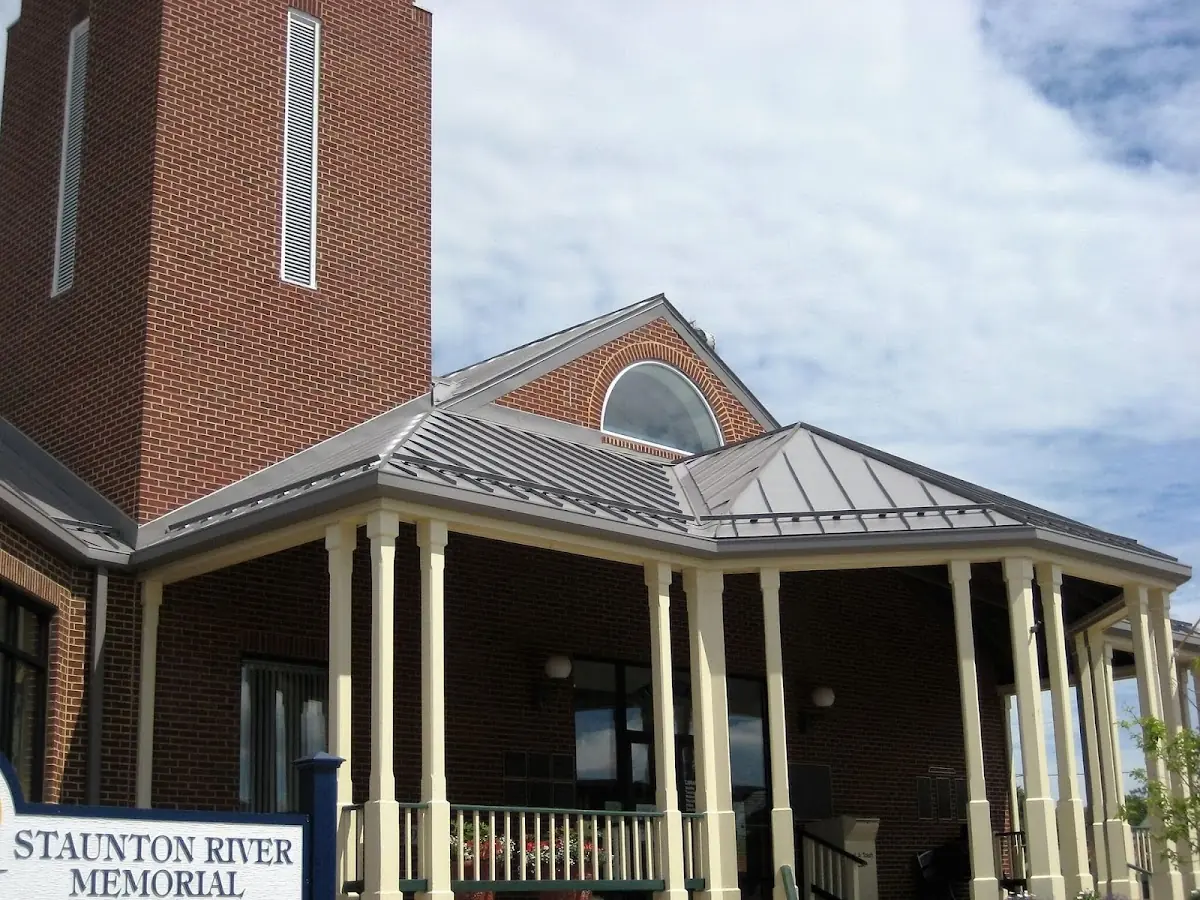 Skilled roofing craftsmen working on a residential roof in Savannah